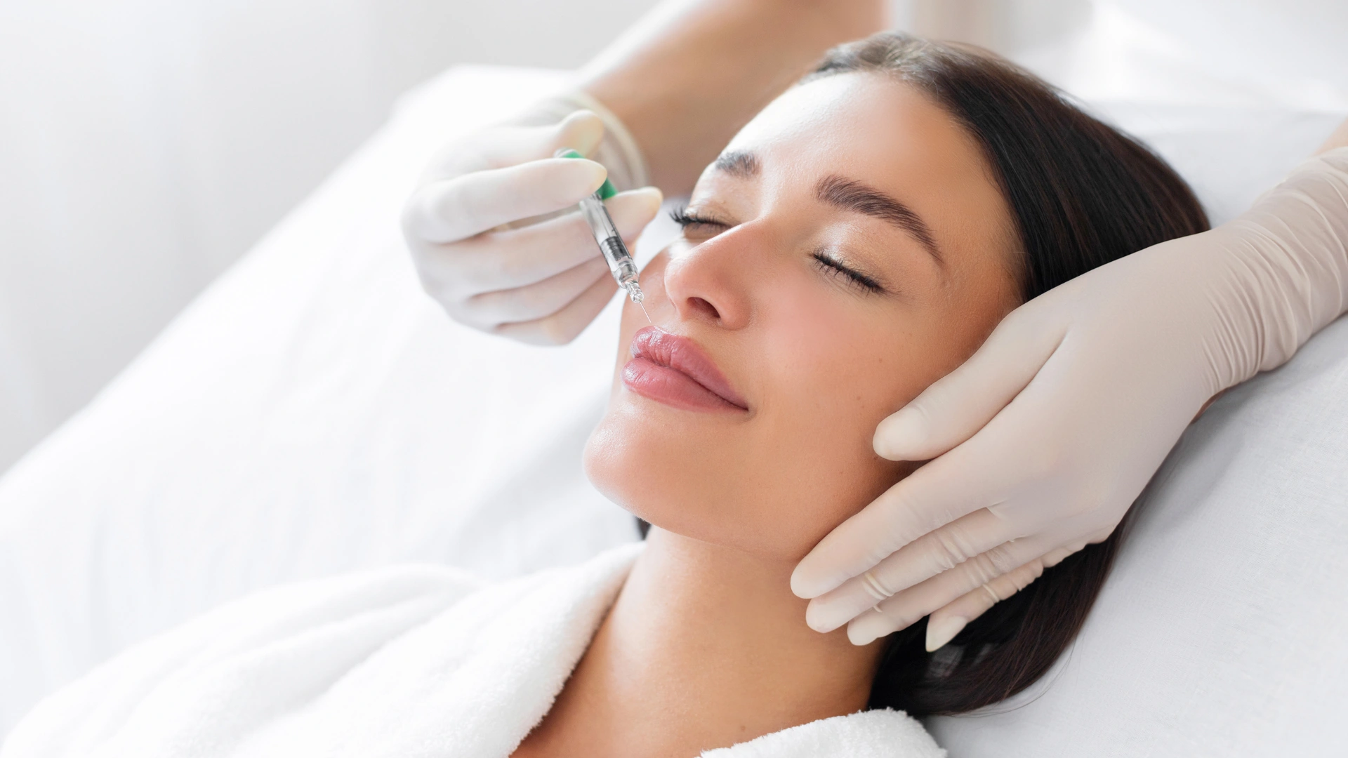 Filler treatment for smooth skin and defined contours at Laser Clinic.